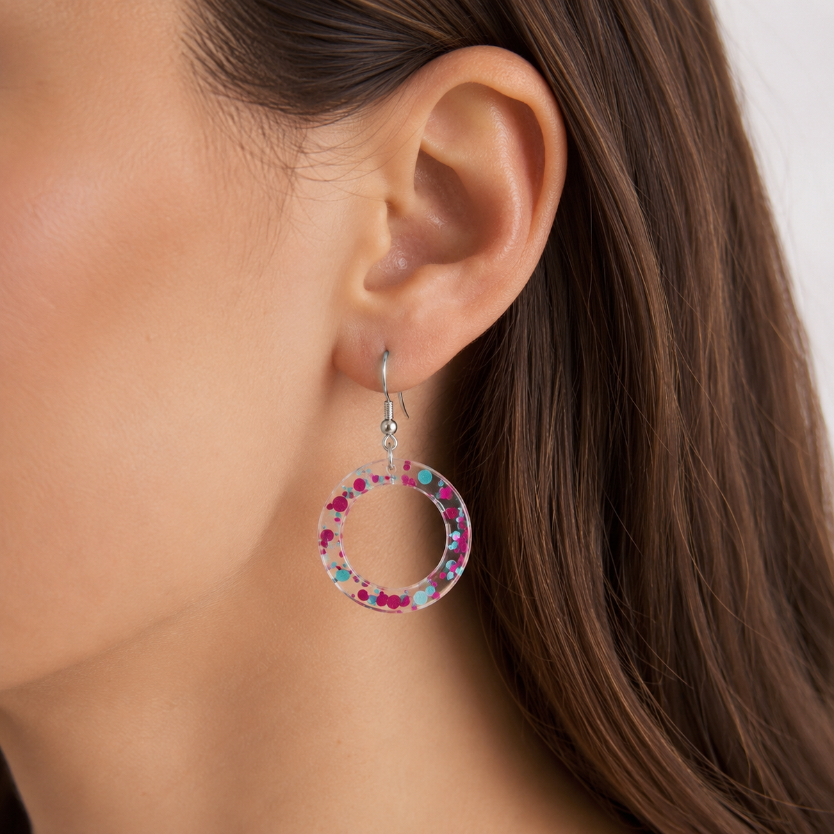 Crystal Clear Confetti Hoop Earrings shown on ear
